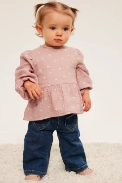 Peplumbluse for baby i myk musselin