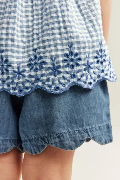 Peplum-bluse med broderi
