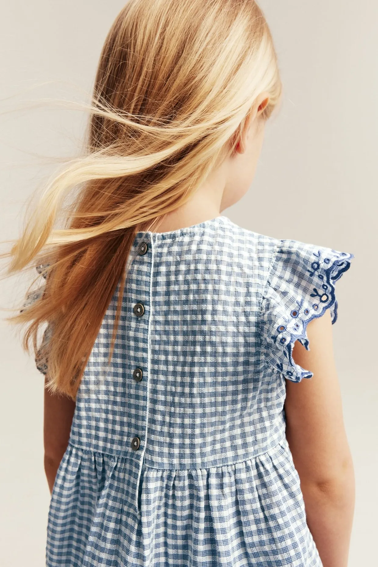 Peplum-bluse med broderi