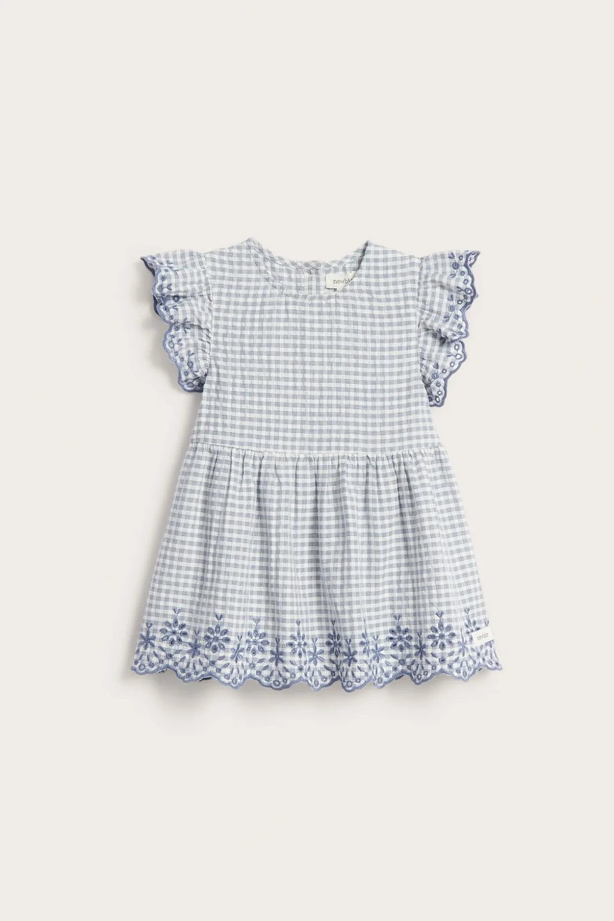 Peplum-bluse med broderi