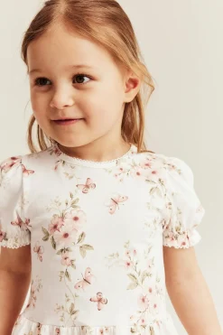 Peplum-topp med blomster og sommerfugler