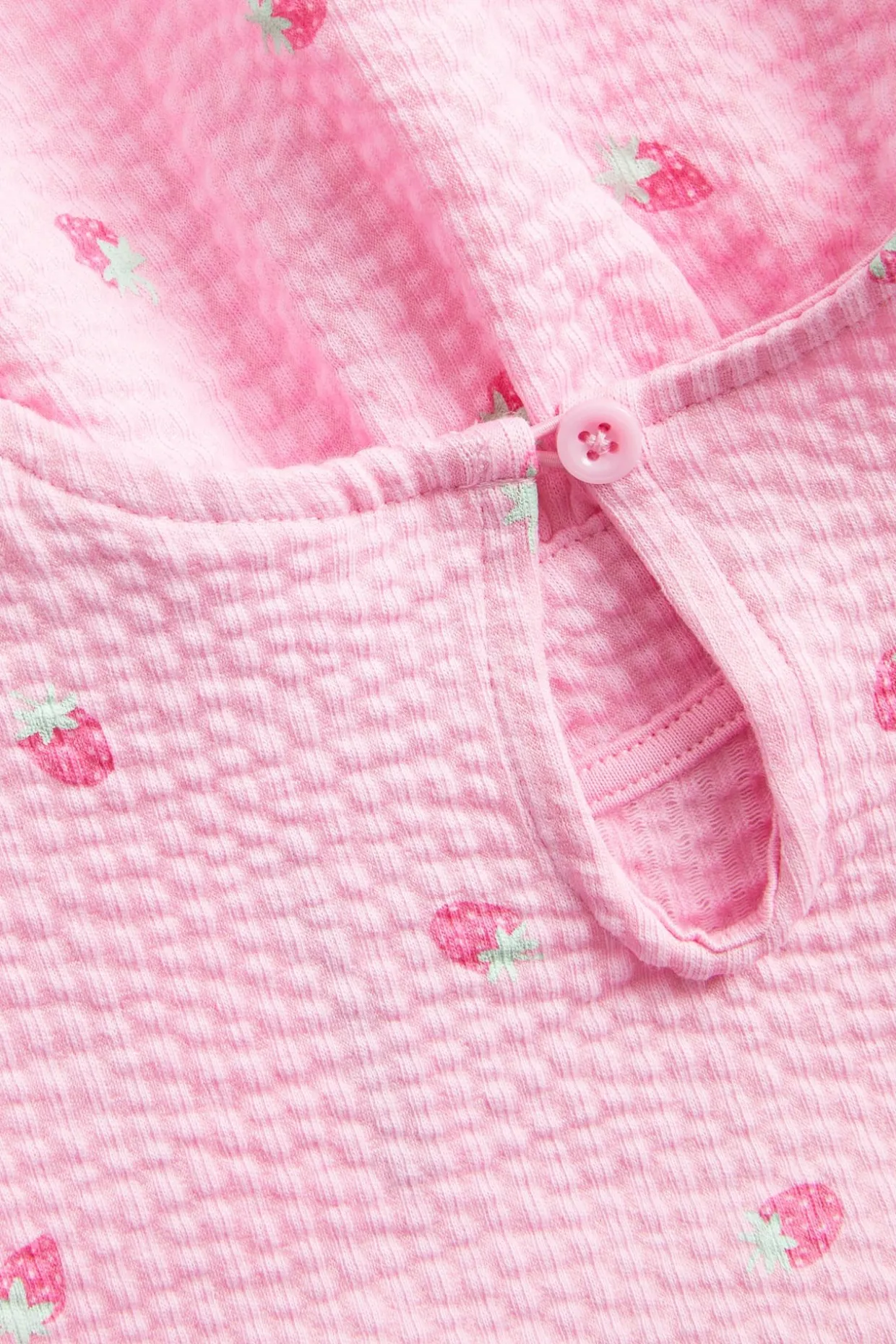 Peplum-topp med jordbærmønster i seersucker