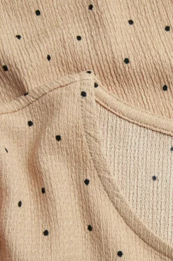 Prikkete topp