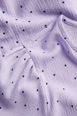 Prikkete topp