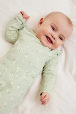 Ribbestrikket body med volang