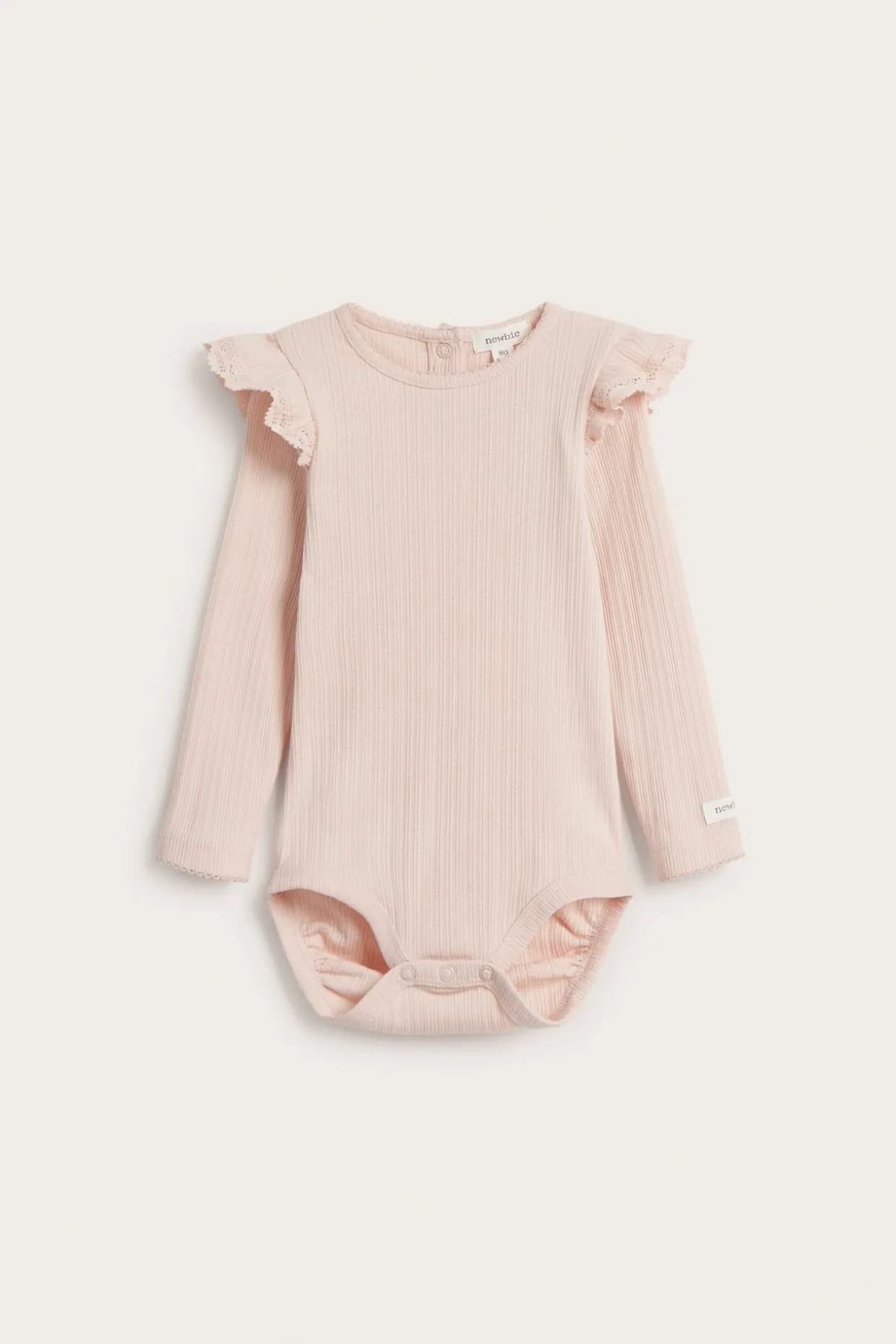 Ribbestrikket body med volang