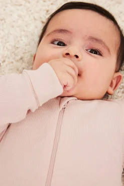 Ribbet jumpsuit med ribbekanter som kan brettes ned