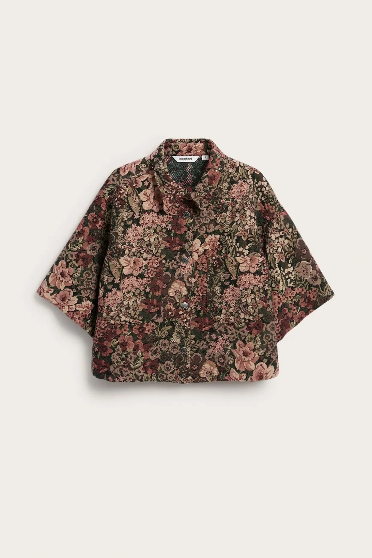 Romslig blomstret topp