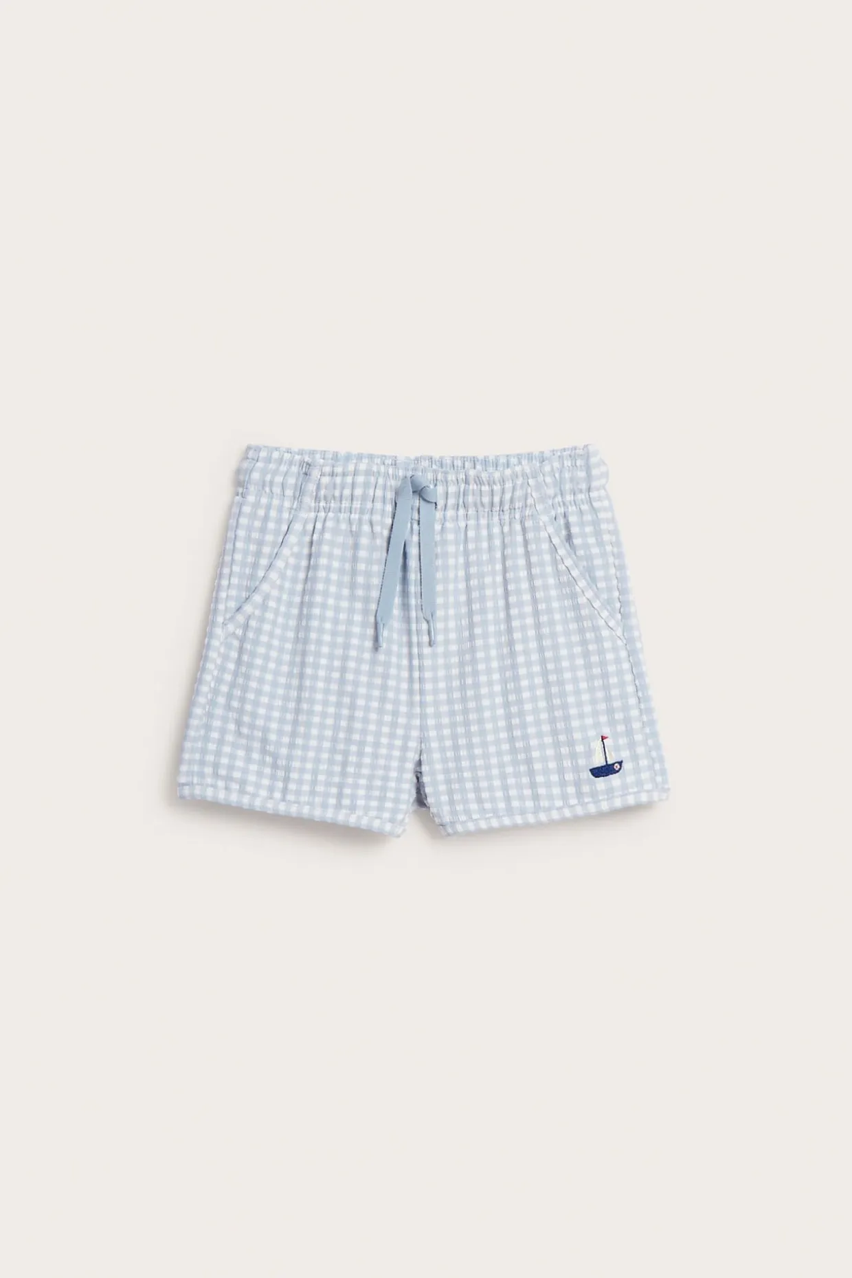 Rutete badeshorts med båt