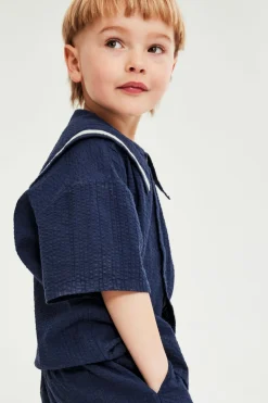 Sett med shorts og skjorte