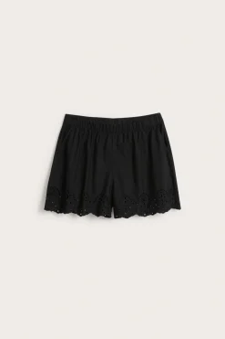 Shorts i bomullspoplin og brodert kant