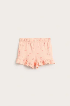 Shorts med ferskenmønster og volangkant