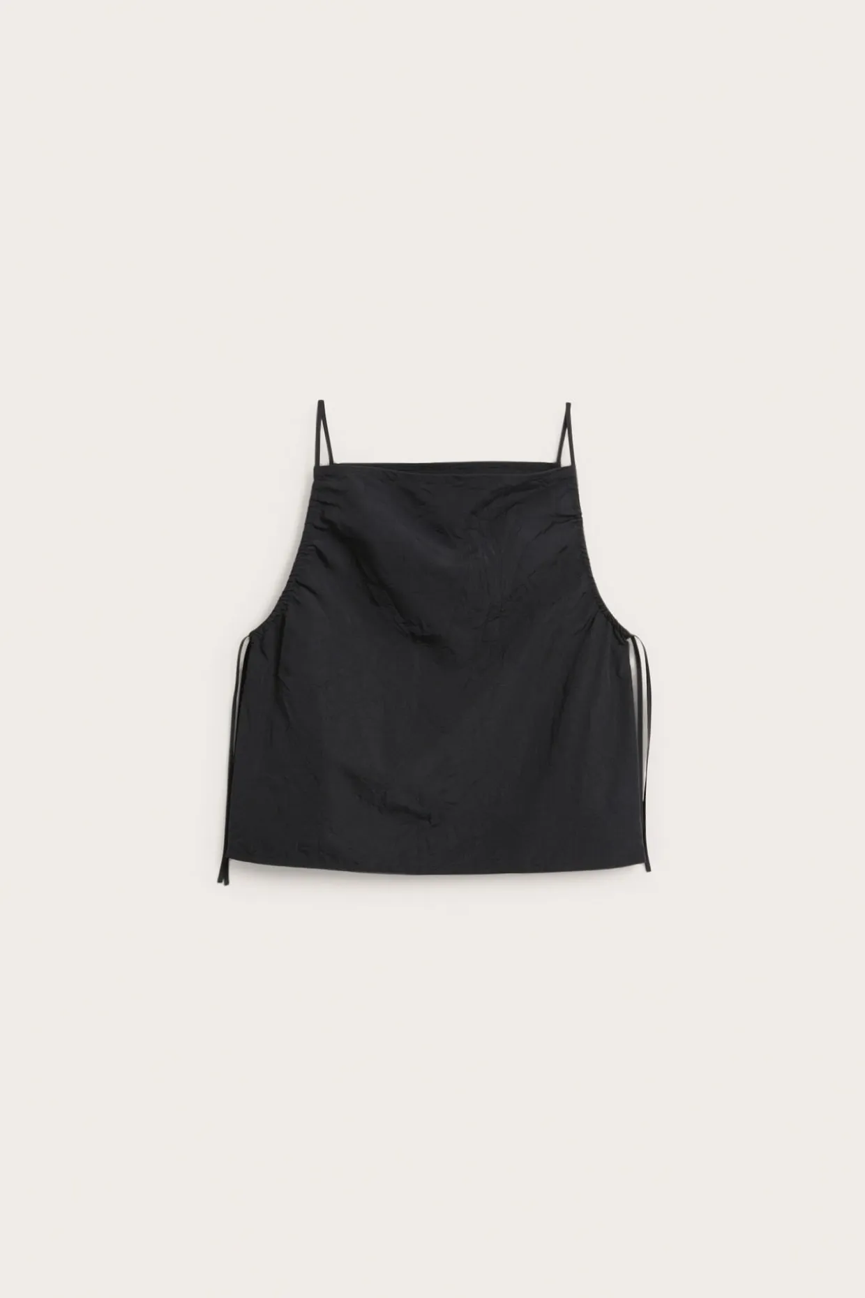 Singlet med draperingsdetaljer