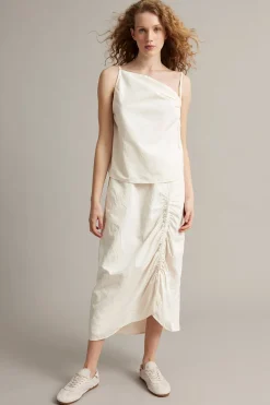 Singlet med draperingsdetaljer