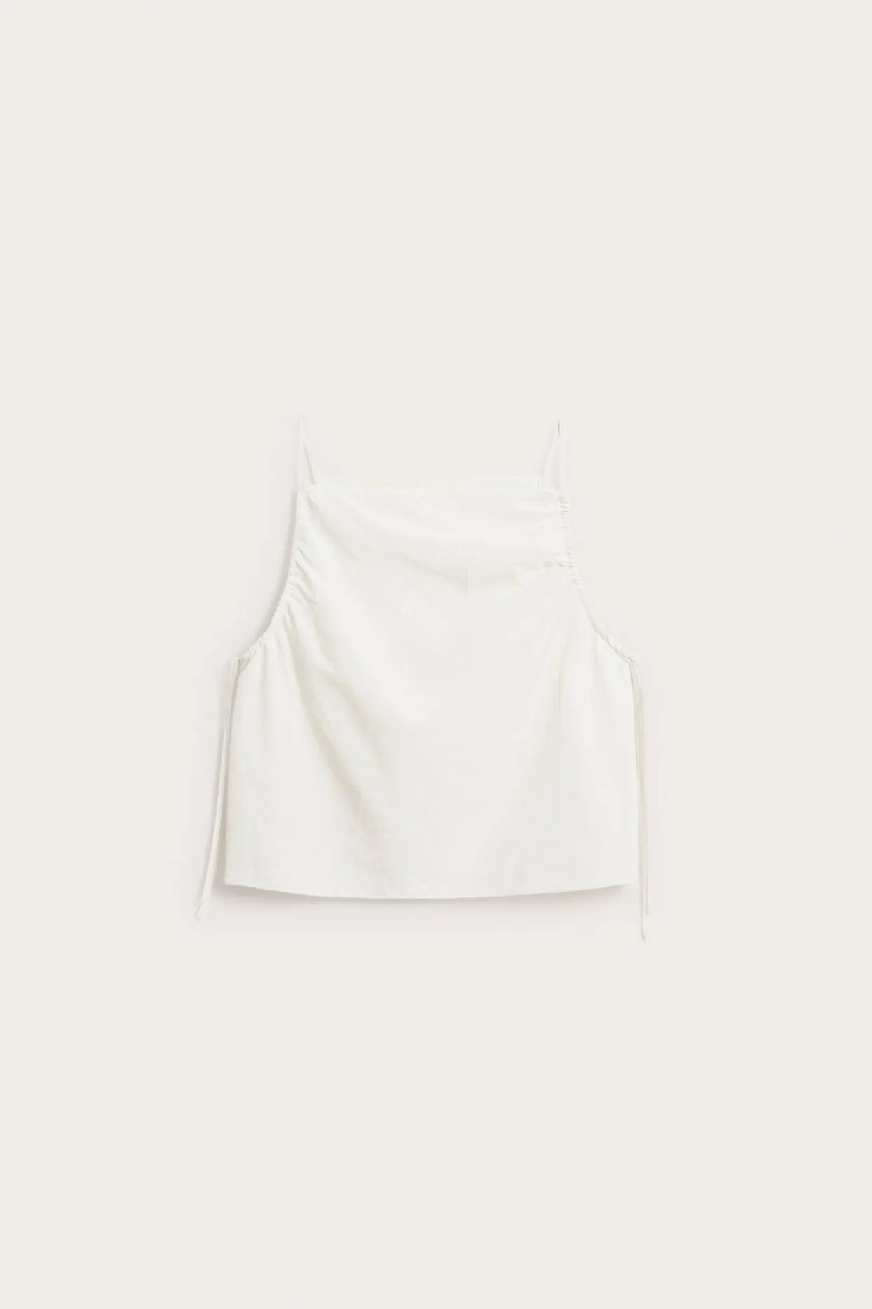 Singlet med draperingsdetaljer