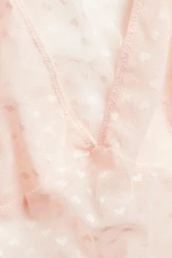 Singlet med hjertemønster i mesh