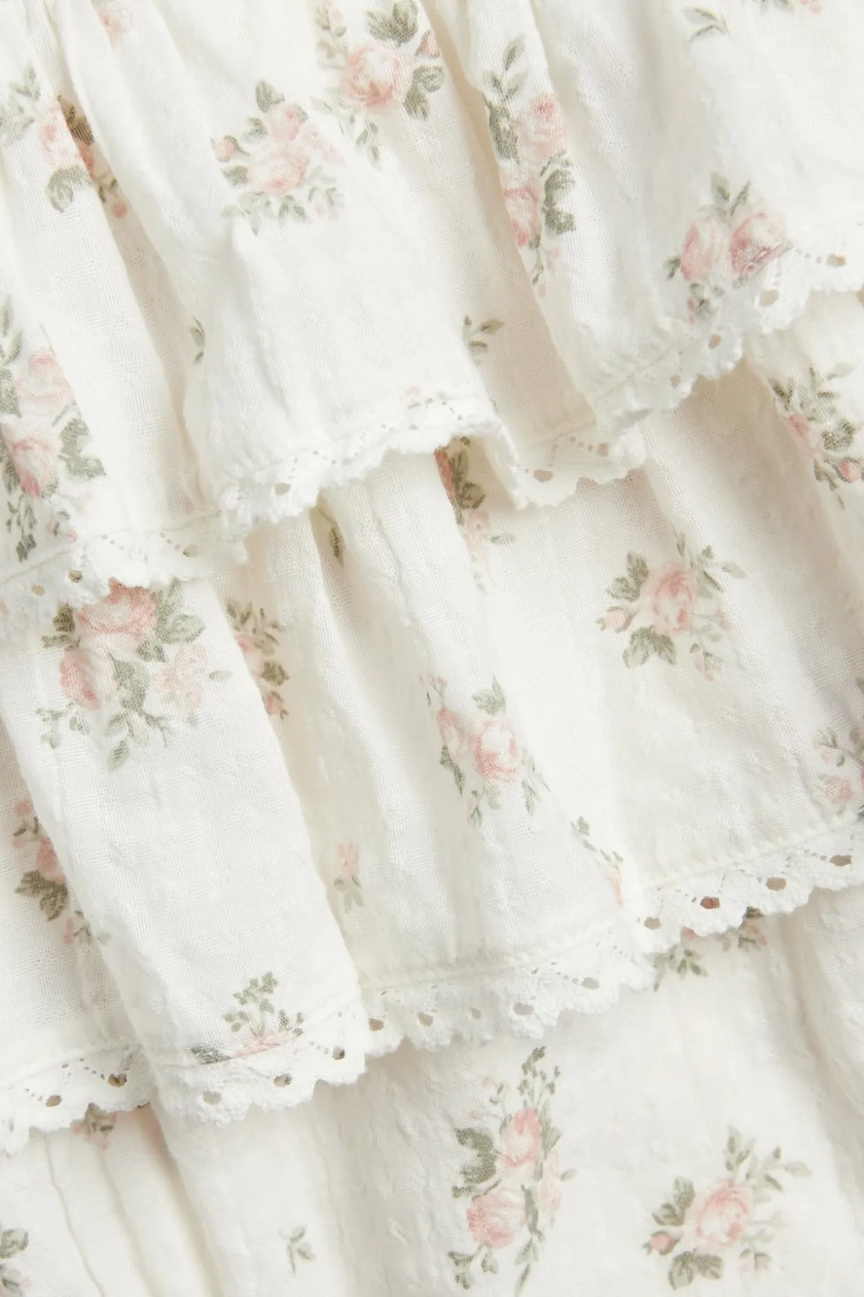 Småblomstrete jumpsuit med volang
