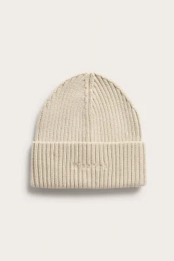 Strikkelue med broderi