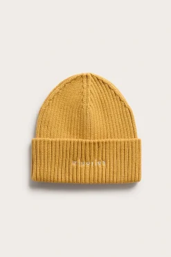 Strikkelue med broderi