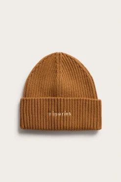 Strikkelue med broderi
