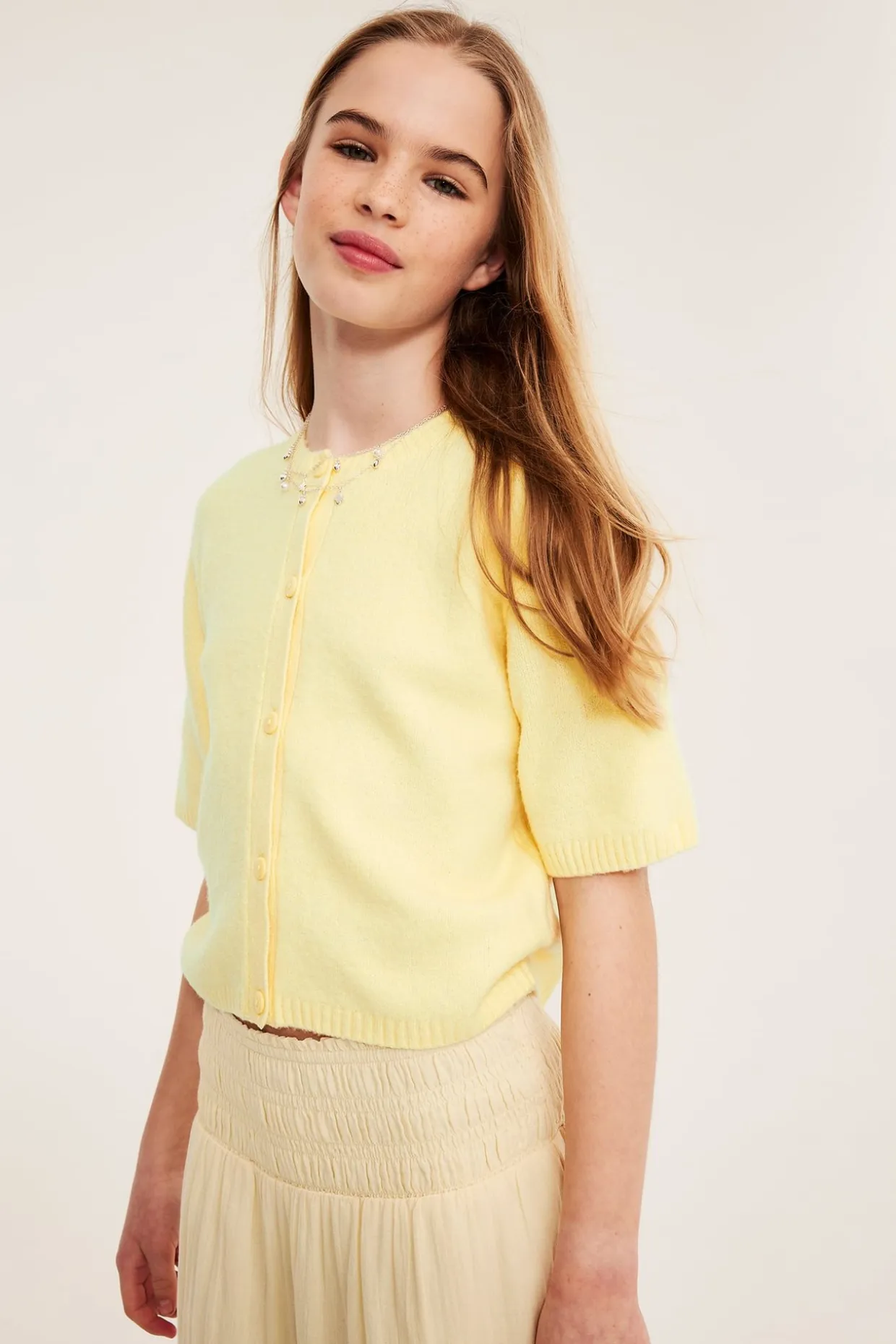 Strikket cardigan med korte ermer