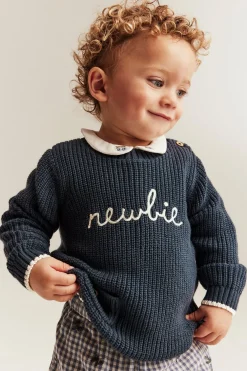 Strikket genser med Newbie-logo