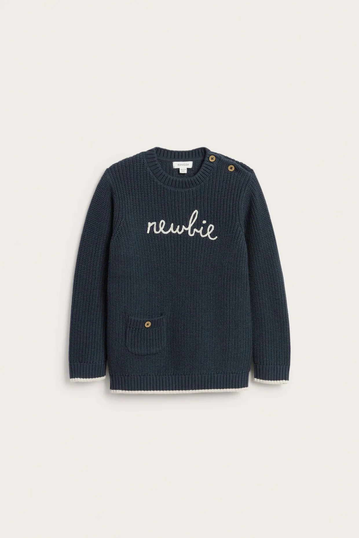 Strikket genser med Newbie-logo