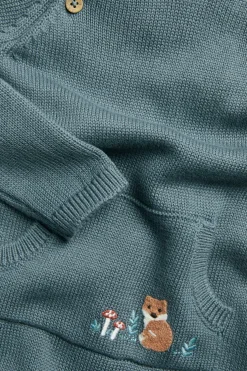 Strikket jumpsuit med broderi