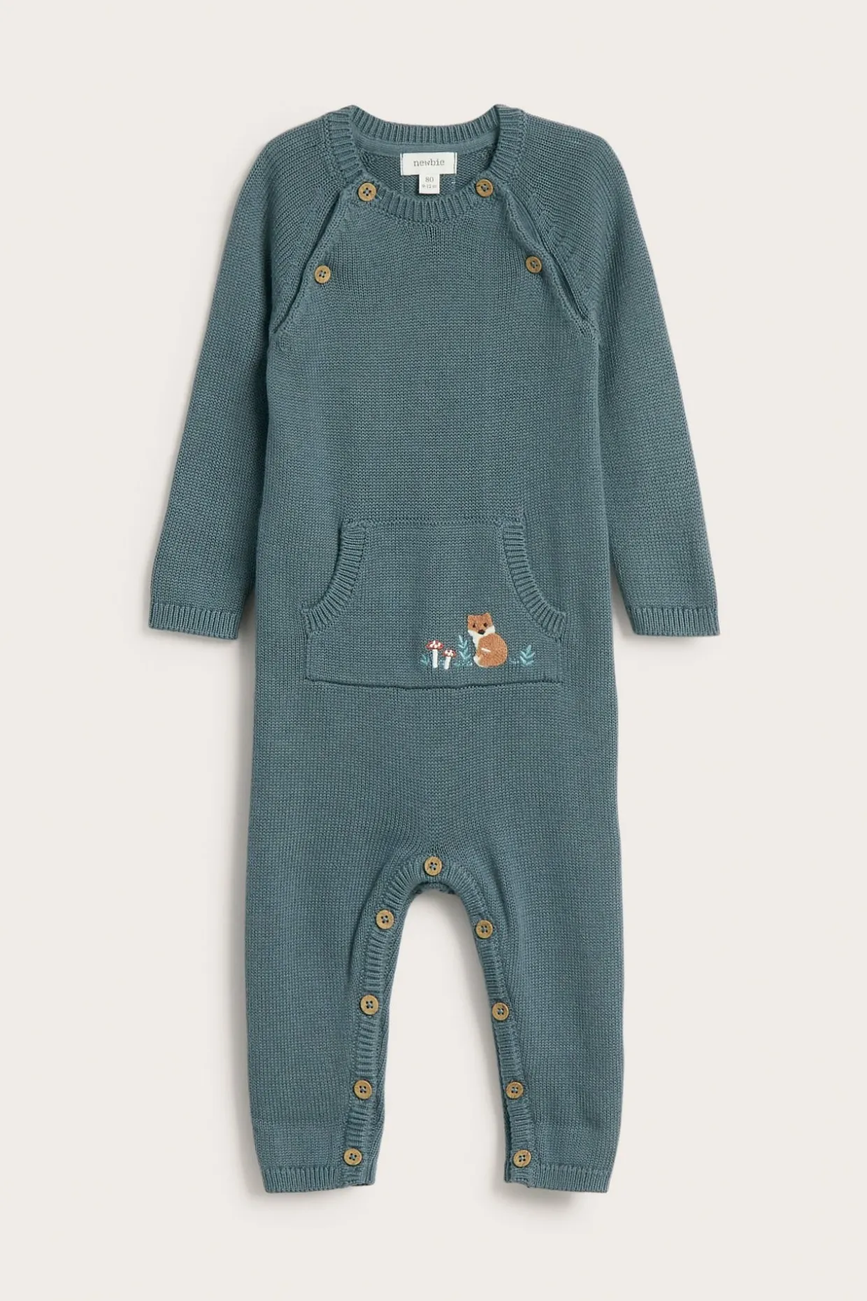 Strikket jumpsuit med broderi