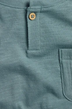 T-skjorte i flosset trikot med lomme