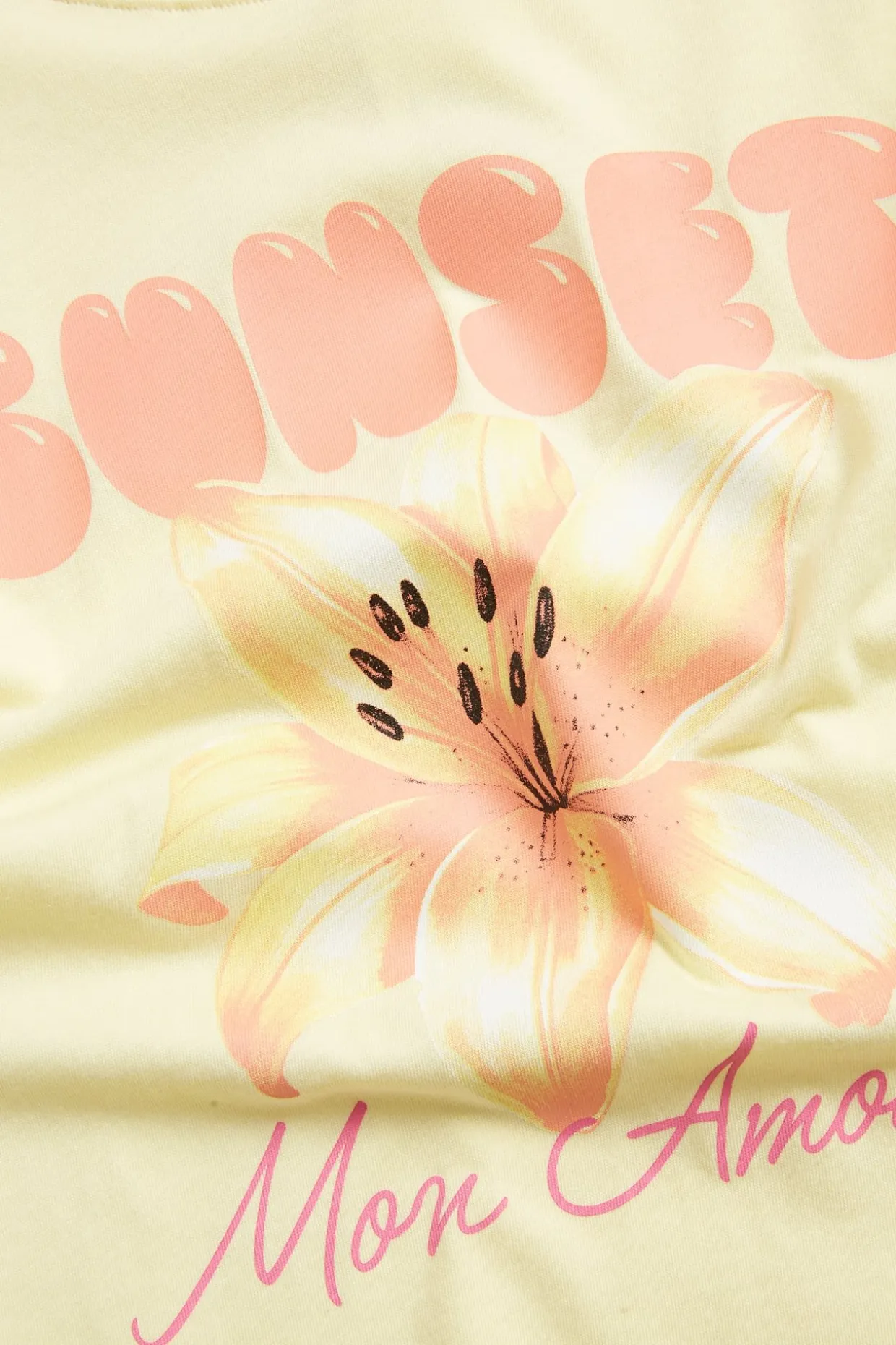 T-skjorte med tekst- og blomstertrykk