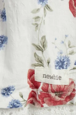 Vevd blomstret kjole
