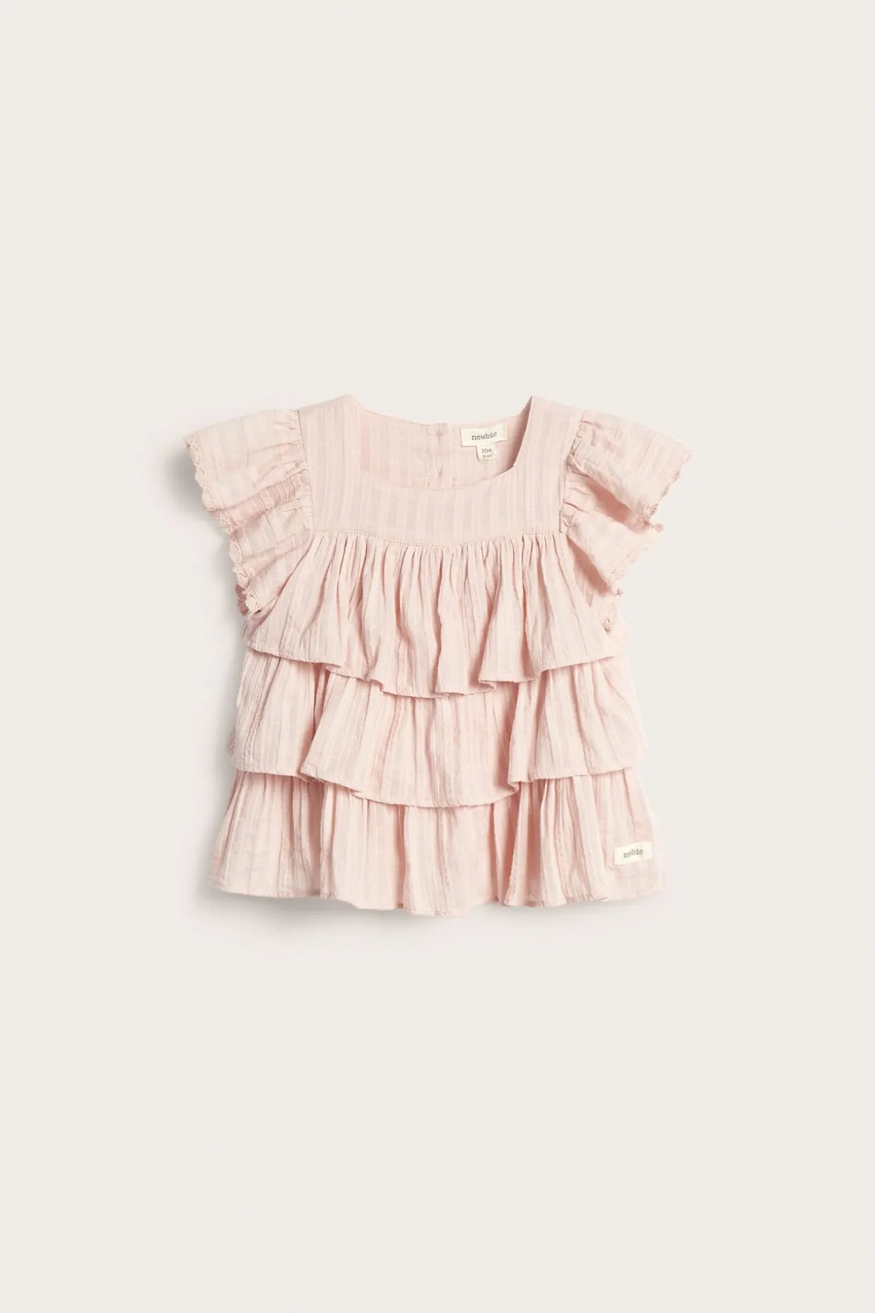 Vevd bluse med volanger